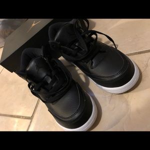 Black and white Jordan’s size 3